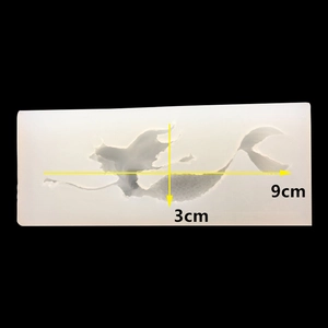 Macro detail of mermaid silicone resin mold showing 9cm length and 3cm width dimensions