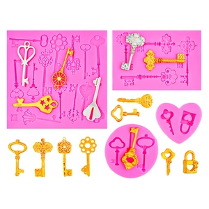 Moldes de silicona rosa para decorar pasteles de fondant con llaves y cerraduras vintage