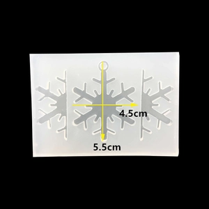 Detailed view of translucent snowflake silicone mold with 5.5cm by 4.5cm dimensions