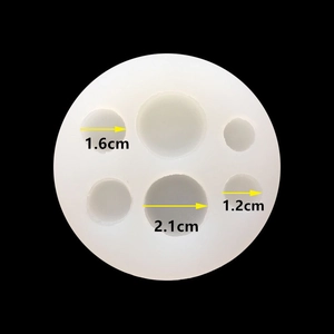 Macro view of multi-size round silicone mold with 1.2cm to 2.1cm diameter markings