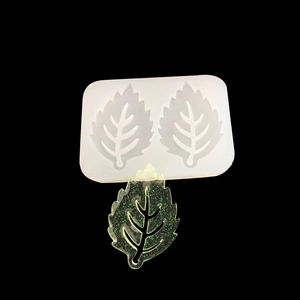 Leaf shaped silicone resin mold for DIY jewelry with sparkling green finished pendant