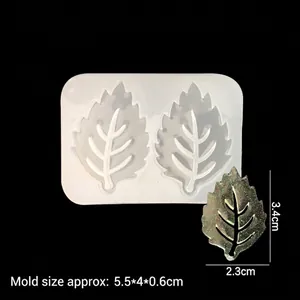 Leaf shaped silicone resin mold for DIY jewelry with finished glitter pendants