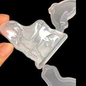 Transparent silicone DIY molds for deer and dolphin shaped pendants with hanging holes