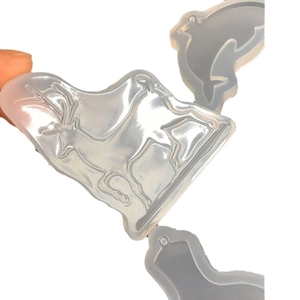 DIY silicone molds for crystal resin featuring deer and dolphin shapes for pendants