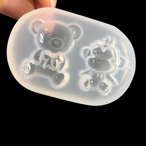 DIY silicone mold for cartoon bear and lion pendant jewelry making with glossy finish