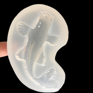 Translucent silicone koi fish mold with detailed scales for DIY resin and sugarcraft