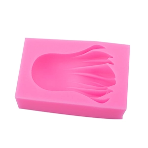 Stampo in silicone rosa con tentacoli di polpo dettagliati per argilla DIY e fondente