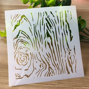 Detailed view of square wood texture stencil for DIY crafts and art journaling