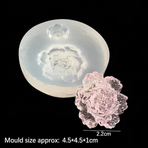 DIY silicone mold for UV crystal resin flowers with pink glitter handicraft sample
