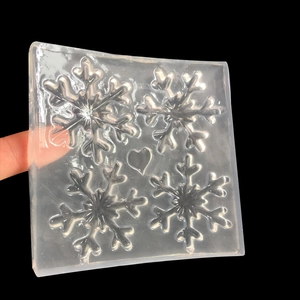 Translucent silicone snowflake and heart mold for DIY resin jewelry and clay crafts
