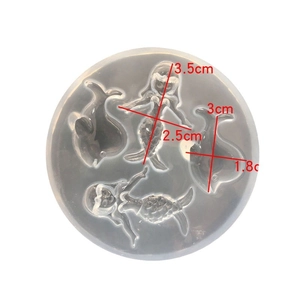 Silicone mold featuring mermaid and dolphin shapes for DIY resin craft and UV glue casting