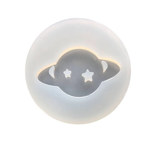 Round silicone mold featuring a ringed planet and stars for DIY epoxy resin crafts