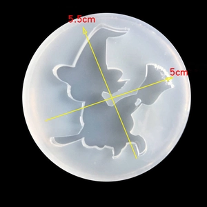 Detail of a witch silhouette resin mold with 5.5cm and 5cm measurement indicators