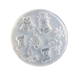 Round transparent silicone mold with 8 Christmas shapes like snowman and tree