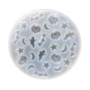Top view of translucent Halloween silicone mold with pumpkin bat and ghost shapes