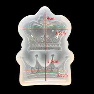 Detail of crown silicone mold with 4cm and 3.5cm size markings on black background