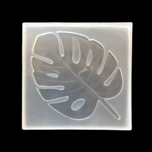 Translucent silicone mold featuring a detailed monstera leaf shape for resin DIY projects