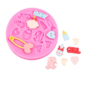 Pink silicone fondant mold featuring baby shower shapes like baby carriage and heart