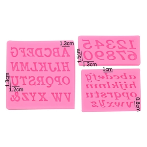 Pink silicone mold set featuring large letters and numbers for fondant cake decoration