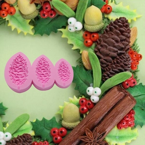 Macro shot of 3-cavity pine cone silicone mold for Christmas fondant and chocolate cake decoration