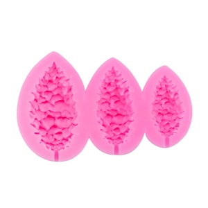 Pink silicone pine cone and leaf fondant mold for Christmas cake decoration