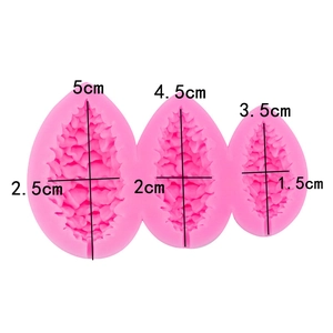 Pinecone silicone mold for fondant and chocolate featuring three various sized leaf designs