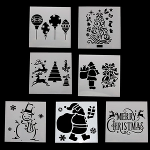 Macro detail of 7-piece Christmas stencils set for drawing featuring holiday patterns