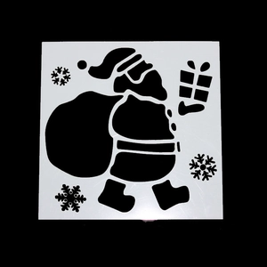 White Christmas painting stencil with Santa Claus and snowflake motifs on black background