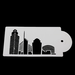 Macro detail of Eiffel Tower and city skyline stencil for cake baking and decorating