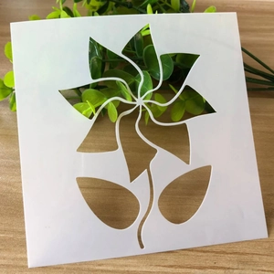 Square stencil featuring a windmill flower cutout for DIY painting and home decoration
