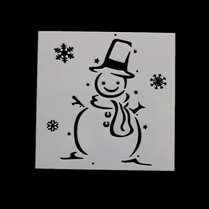 Detailed view of square flexible stencil with snowman and snowflake patterns for DIY art