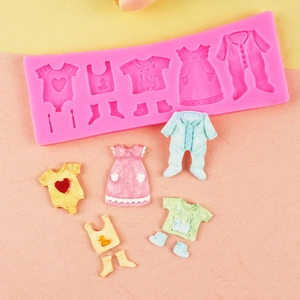 Pink silicone baby clothes fondant mold with miniature shirts shoes and bib shapes