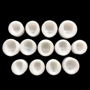 13-piece white silicone facial mold set for clay and fondant doll making on black background