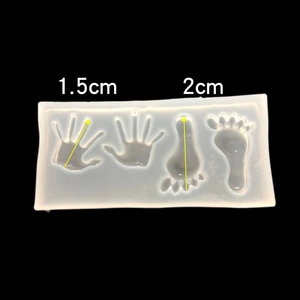 Silicone mold featuring 1.5cm handprint and 2cm footprint cavities for DIY resin crafts