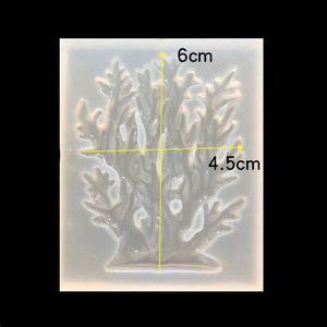 Macro shot of coral-shaped silicone mold with 6cm by 4.5cm dimension annotations