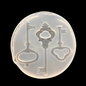 Round translucent silicone mold featuring three vintage key patterns for DIY resin jewelry
