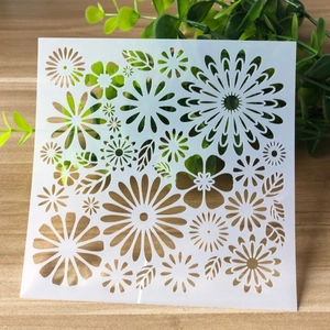 DIY flower painting stencil with floral patterns on a natural wood surface for art