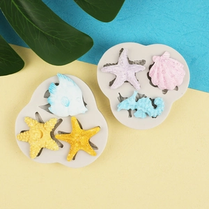 Ocean starfish and shell silicone molds with colorful fondant marine life shapes