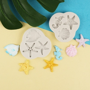 Marine life silicone molds set featuring starfish, seahorse, shell and tropical fish shapes