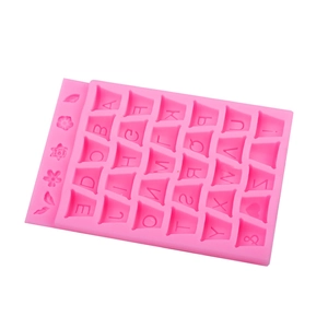 Pink silicone mold with A-Z letters and flower shapes for DIY chocolate and cake baking