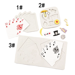 Detail of Alice in Wonderland silicone molds for poker, clock and bottle fondant shapes