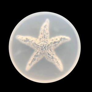 Detail of translucent starfish silicone mold with intricate textures for DIY resin casting