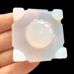 Macro detail of a 3D translucent silicone umbrella mold for DIY resin pendant casting