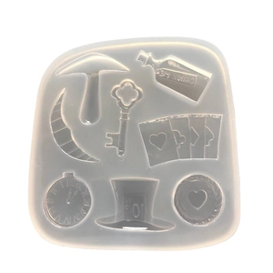 Silicone mold with Alice Wonderland motifs including hat, clock, and cards for resin art