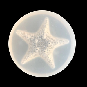 Macro detail of starfish silicone mold showing fine texture for DIY resin jewelry