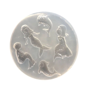 Round translucent silicone mold featuring five dolphin and mermaid shapes for resin DIY