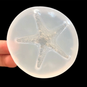 Detail of starfish shaped silicone mold for DIY resin jewelry and keychain crafts