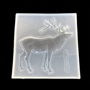 Detailed translucent silicone mold featuring a 3D geometric reindeer for DIY resin art