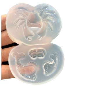 Translucent silicone mold for DIY crafts featuring large crab and sea creature shapes