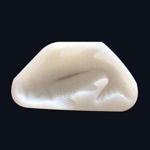Macro shot of 3D koi fish silicone mold showing intricate scales for cake and mousse